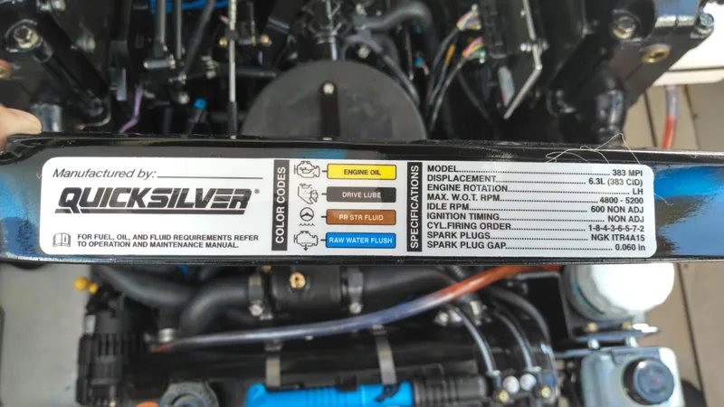 Slide: The Image of Quicksilver engine label on 2008 Sea Ray 260 Sundancer, detailing specifications and color codes. - 27