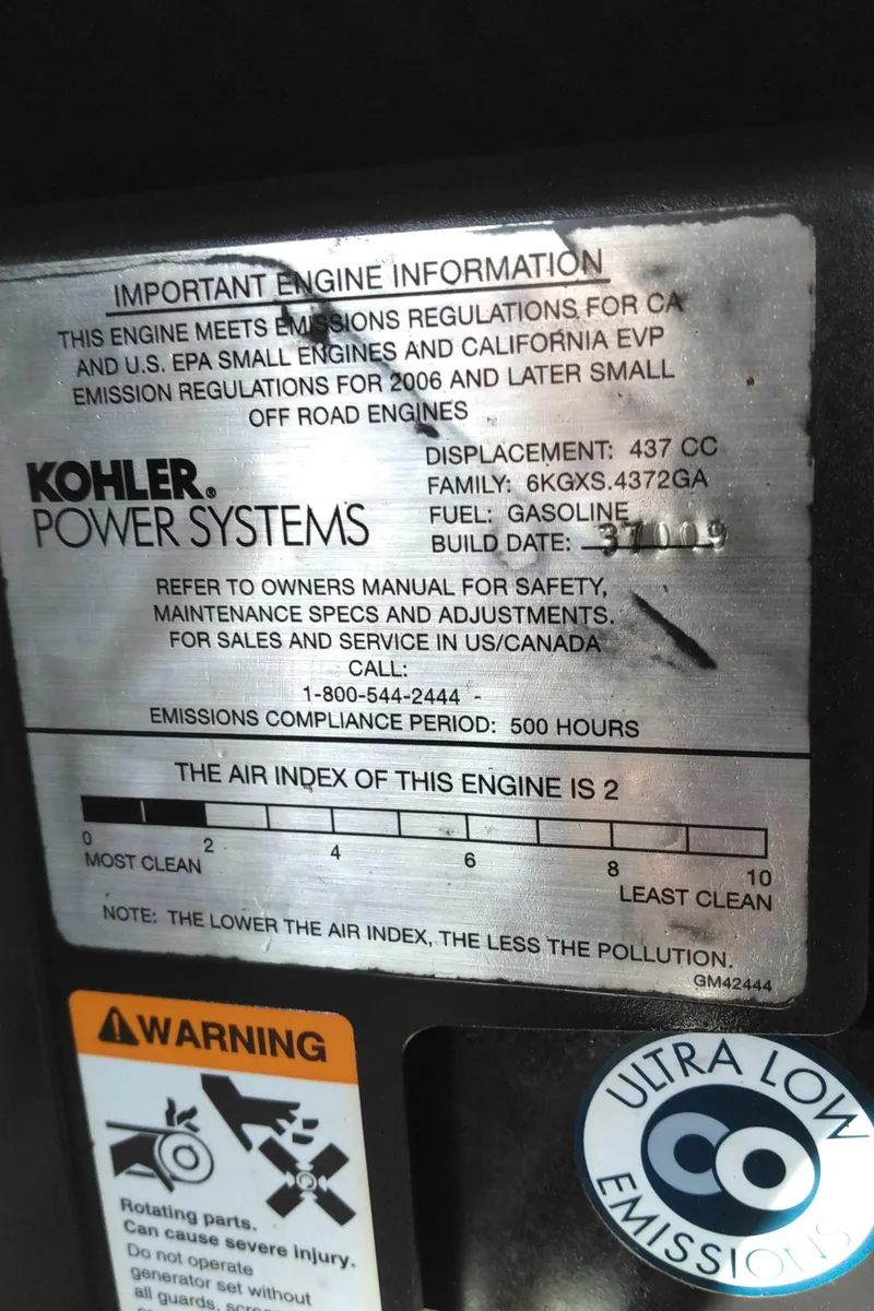 Slide: The Image of Kohler engine label on 2008 Sea Ray 260 Sundancer, highlighting emissions and specifications. - 32