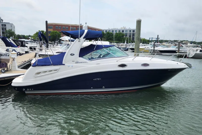 Slide: The Image of 2008 Sea Ray 260 Sundancer boat docked in marina. - 5