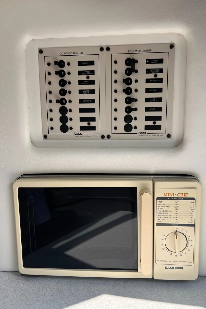 Slide: The Image of 1995 Powerquest 290 Enticer FX control panel and microwave interior view. - 12