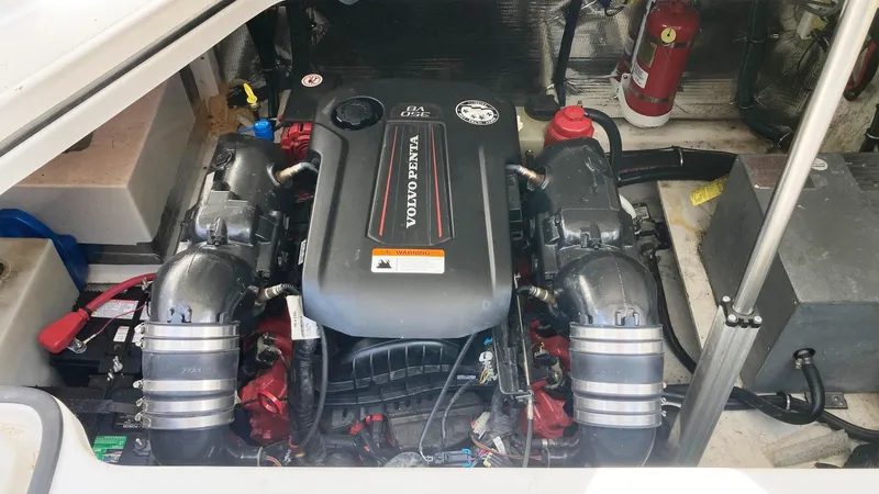 Slide: The Image of 2016 Regal 28 Express engine compartment with Volvo Penta engine. - 13