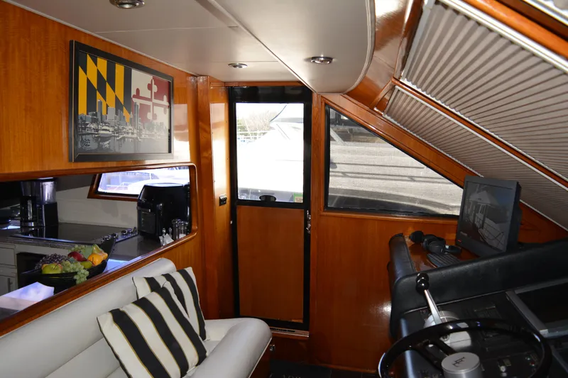 Slide: The Image of Interior of 1989 Viking Motor Yacht with modern decor and helm station. - 43