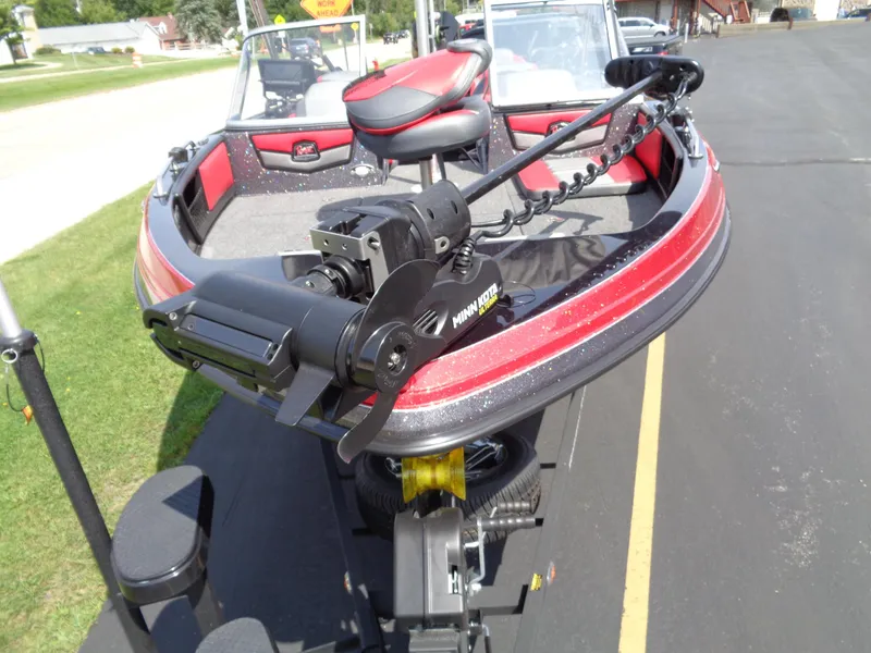 Slide: The Image of 2023 Ranger 2080MS A Pack boat with Minn Kota trolling motor on a sunny day. - 12