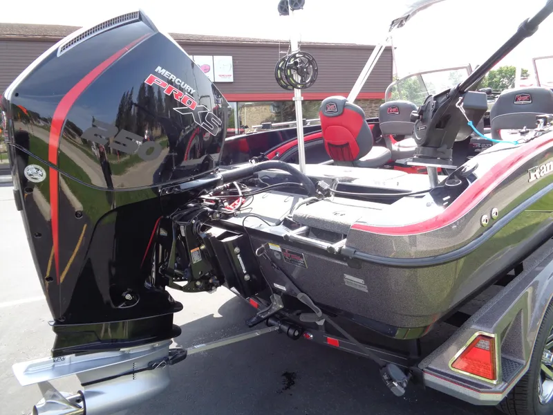 Slide: The Image of 2023 Ranger 2080MS A Pack boat with Mercury Pro XS engine, parked outdoors. - 21