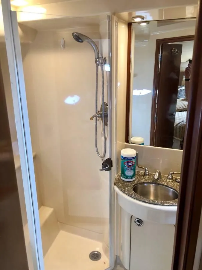 Slide: The Image of 2005 Meridian 459 Motoryacht bathroom with shower and sink. - 19