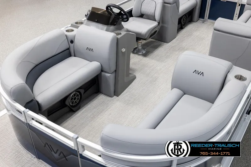 Slide: The Image of 2025 Avalon VLS QL pontoon boat interior with gray seating and steering console. - 10