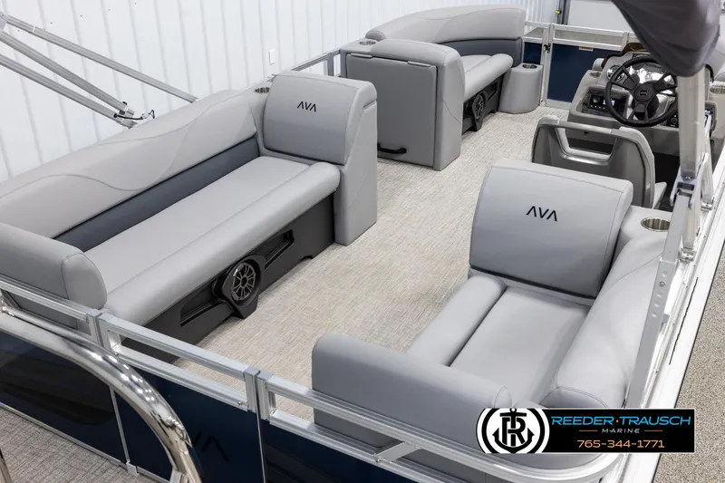 Slide: The Image of 2025 Avalon VLS QL pontoon boat interior with gray seating and steering console. - 12