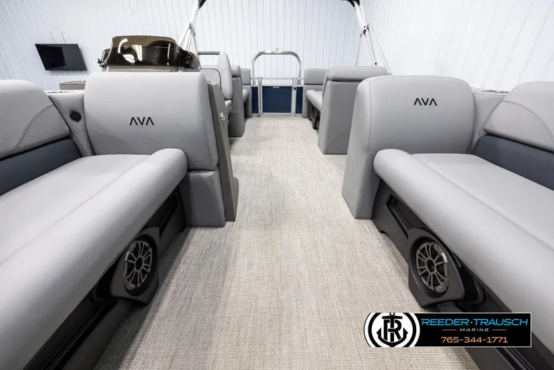 Slide: The Image of 2025 Avalon VLS QL boat interior with gray seating and carpeted floor. - 13