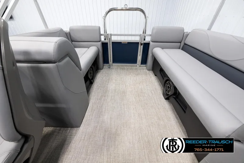 Slide: The Image of Interior of 2025 Avalon VLS QL pontoon boat with gray seating and carpet flooring. - 15