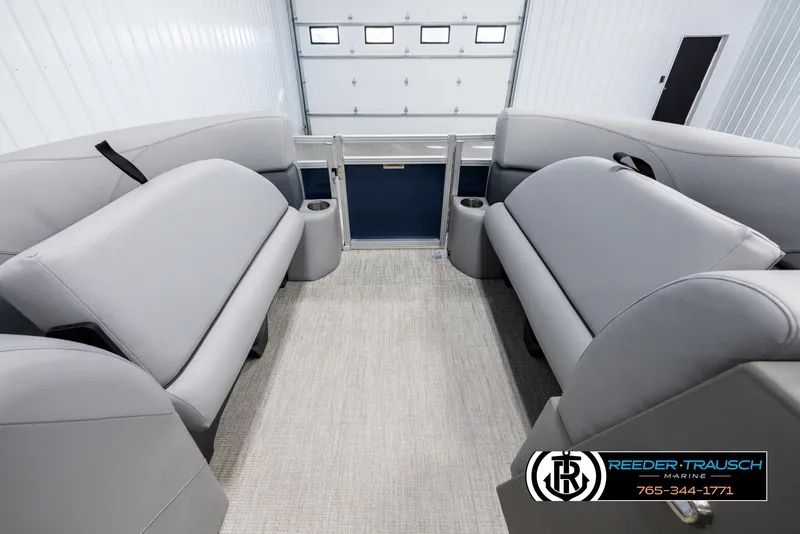 Slide: The Image of Interior of 2025 Avalon VLS QL pontoon boat with gray seating and carpet. - 19