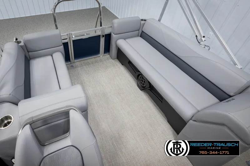 Slide: The Image of Luxurious 2025 Avalon VLS QL boat interior with gray seating and carpet flooring. - 22