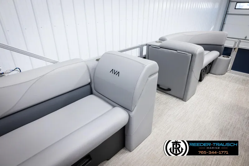Slide: The Image of 2025 Avalon VLS QL boat interior with gray seating and logo. - 24