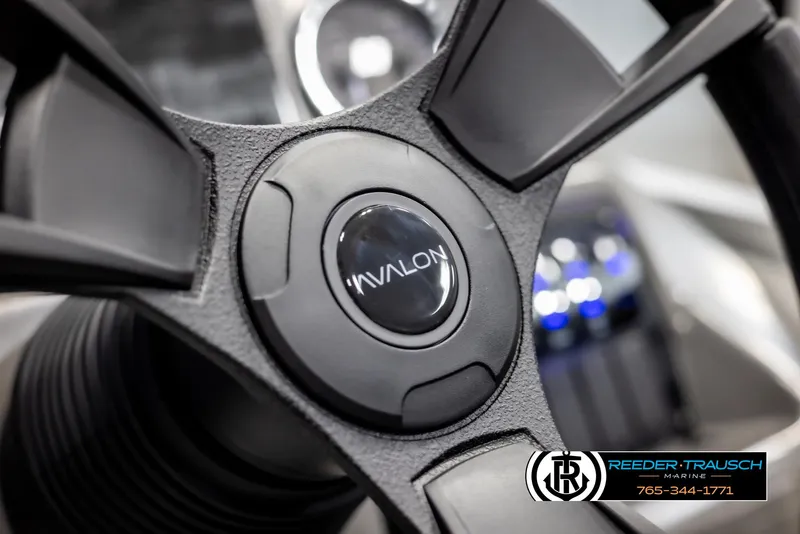 Slide: The Image of Close-up of 2025 Avalon VLS QL steering wheel with logo. - 28