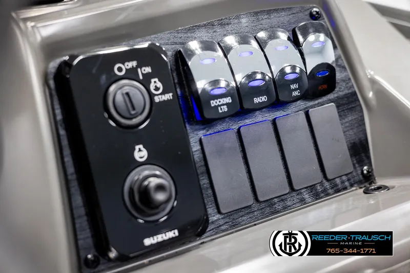 Slide: The Image of Control panel of 2025 Avalon VLS QL boat with switches and ignition. - 32