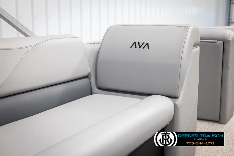 Slide: The Image of 2025 Avalon VLS QL boat interior with gray seating and logo. - 34