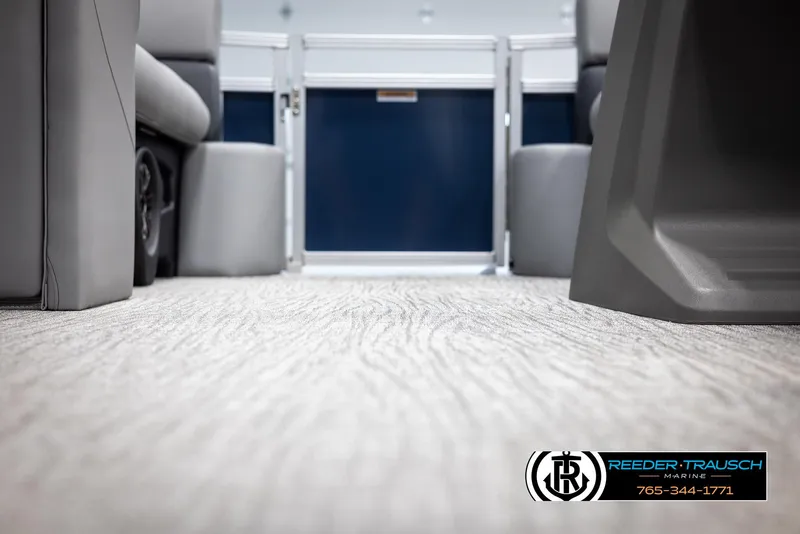 Slide: The Image of Interior view of 2025 Avalon VLS QL boat with modern seating and flooring. - 38