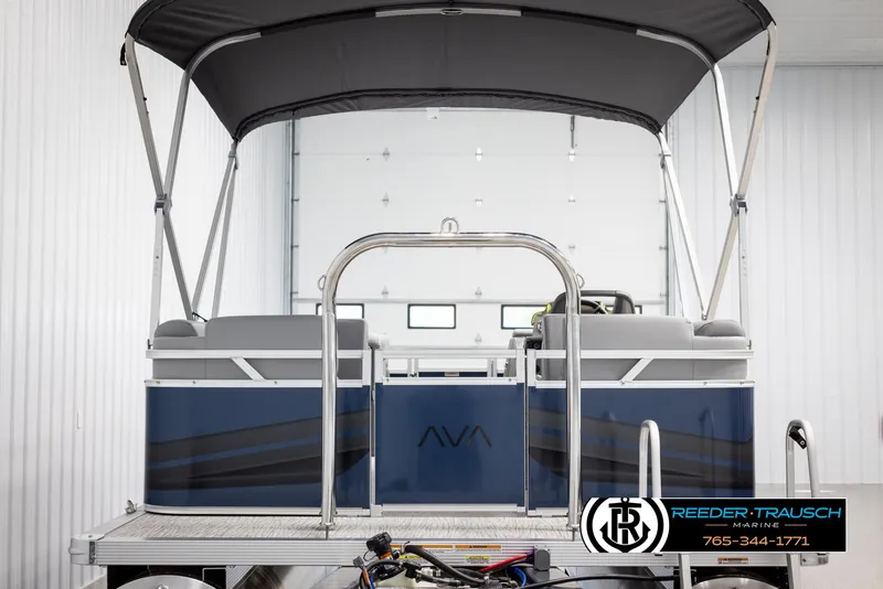 Slide: The Image of 2025 Avalon VLS QL pontoon boat with canopy in showroom. - 7