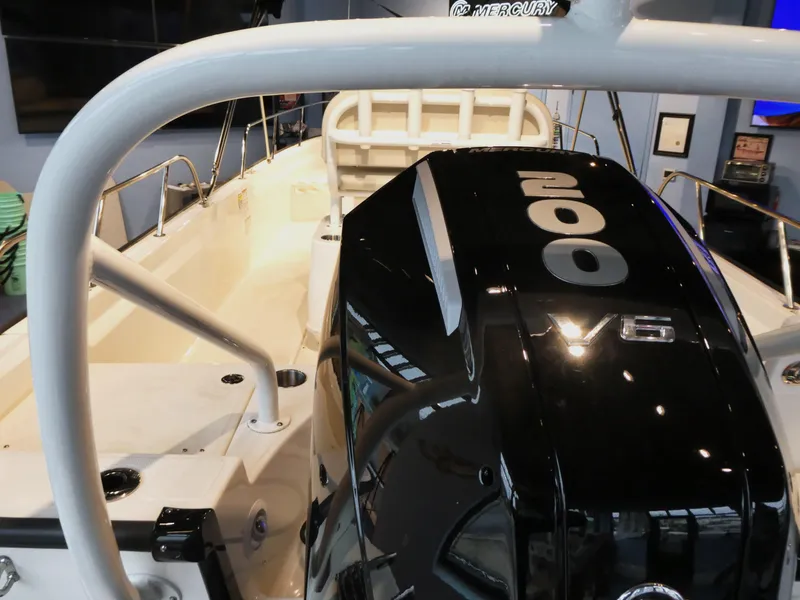 Slide: The Image of 2024 Boston Whaler 210 Montauk with powerful Mercury 200 V6 engine. - 2