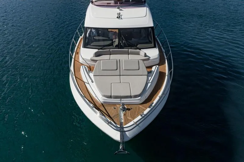 Slide: The Image of 2022 Princess F55 yacht on calm blue water, aerial view. - 19