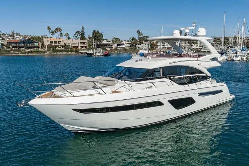 Slide: The Image of Luxurious 2022 Princess F55 yacht cruising in a scenic marina setting. - 20