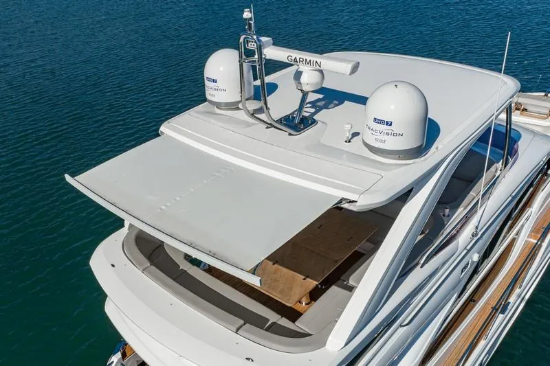 Slide: The Image of 2022 Princess F55 yacht with Garmin radar, sleek design, and spacious deck. - 26