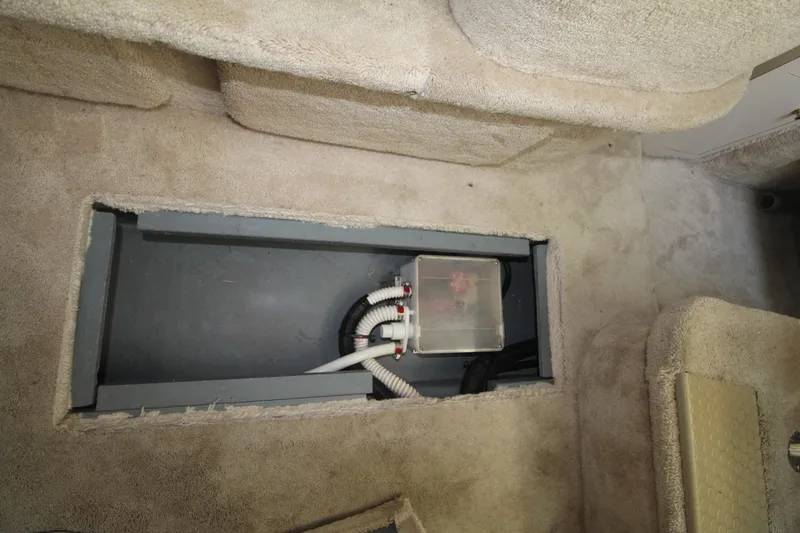 Slide: The Image of Bilge compartment of 2000 Sea Ray 340 Sundancer with visible wiring and hoses. - 36