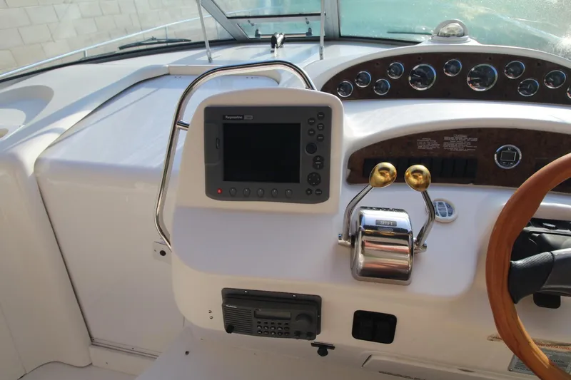 Slide: The Image of Control panel of a 2000 Sea Ray 340 Sundancer boat with navigation equipment. - 7