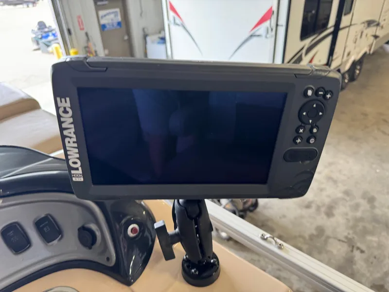 Slide: The Image of Lowrance fish finder on 2019 Sun Tracker Fishin' Barge 20 DLX boat dashboard. - 18