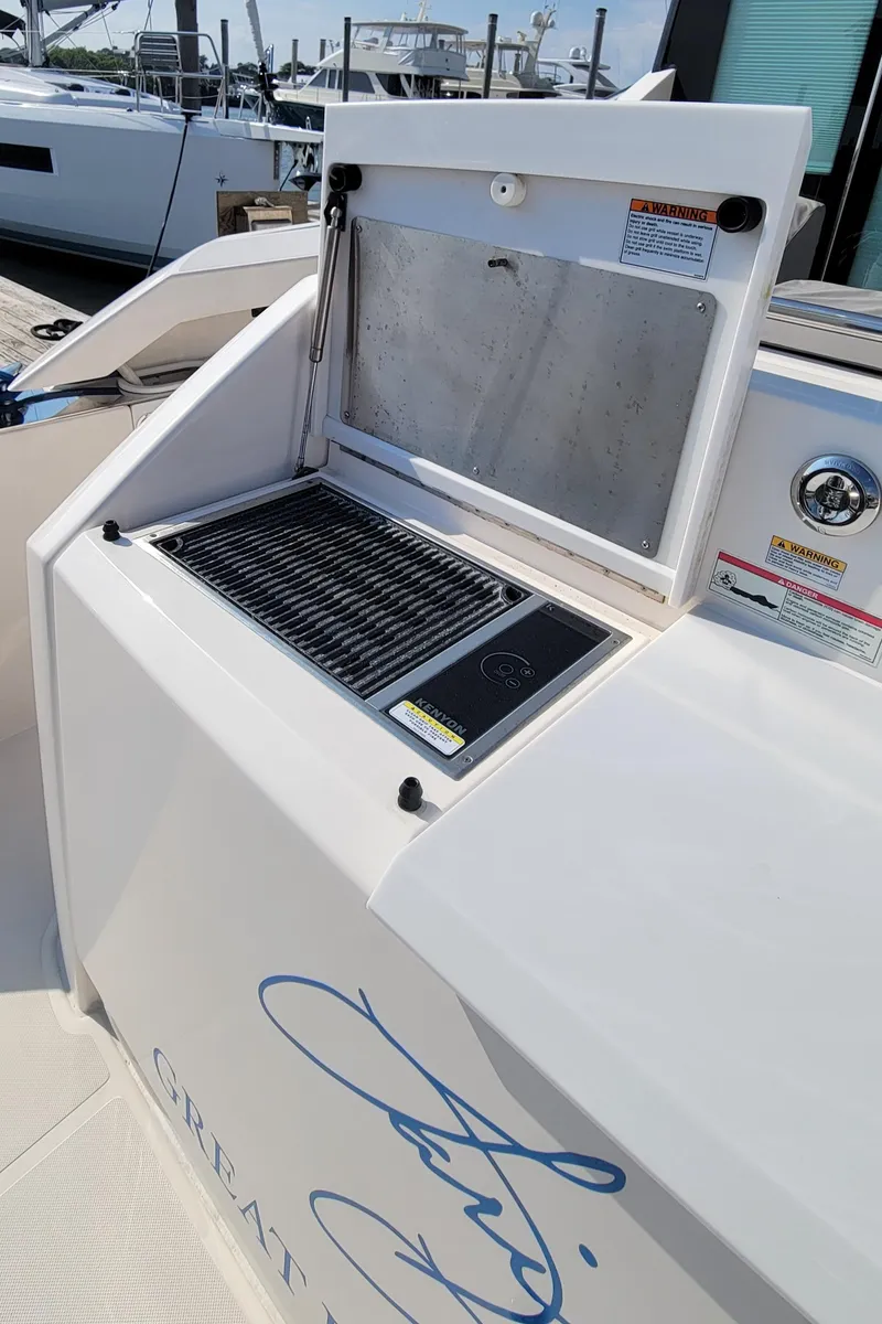 Slide: The Image of Outdoor grill on 2018 Tiara Yachts 39, docked at marina. - 20