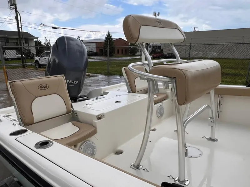 Slide: The Image of 2016 Key West 210 Bay Reef boat with seating and Yamaha outboard motor. - 9