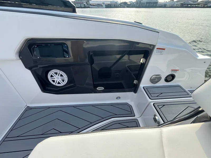 Slide: The Image of 2025 Monterey 255 Super Sport boat interior with sleek design and modern features. - 15