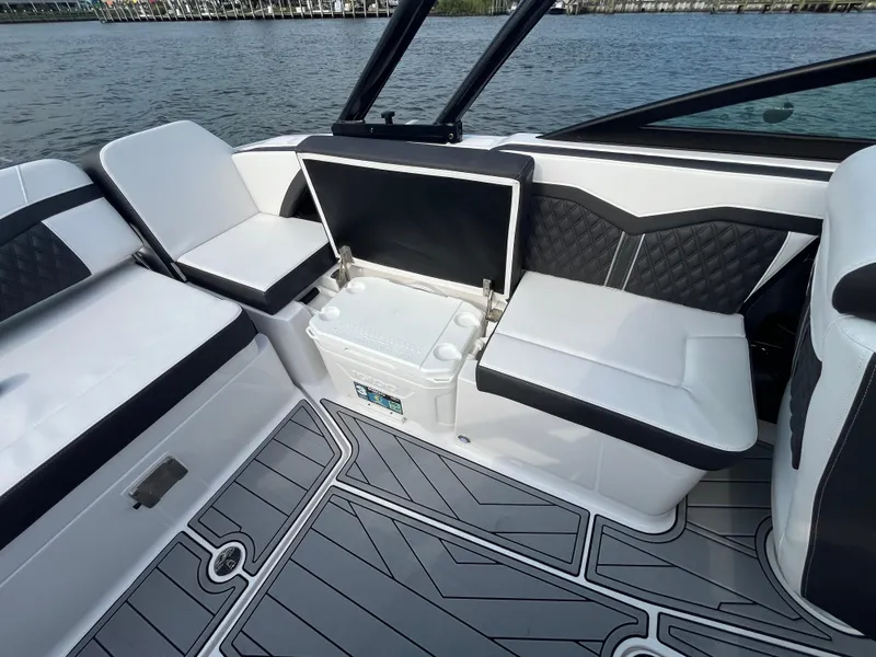 Slide: The Image of 2025 Monterey 255 Super Sport boat interior with sleek seating and modern design. - 18