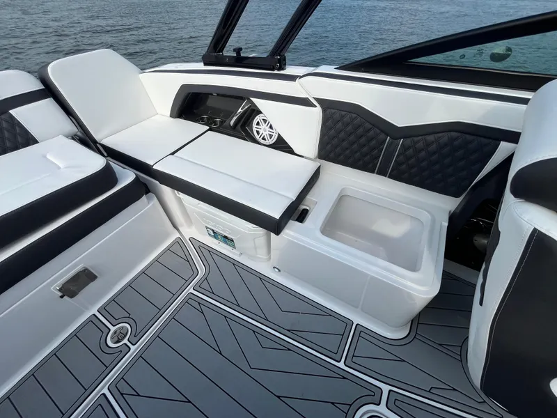 Slide: The Image of 2025 Monterey 255 Super Sport boat interior with sleek seating and modern design. - 20