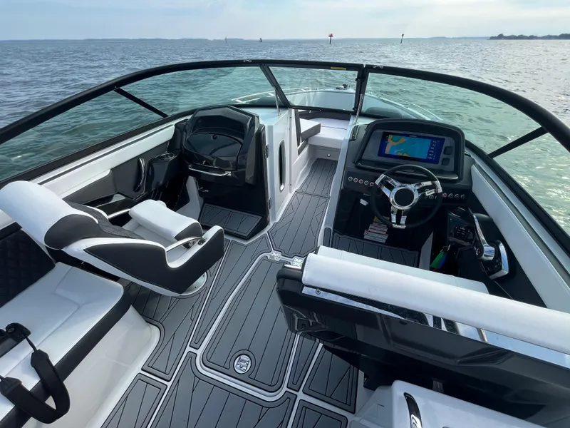 Slide: The Image of 2025 Monterey 255 Super Sport boat interior with sleek design and modern dashboard. - 24