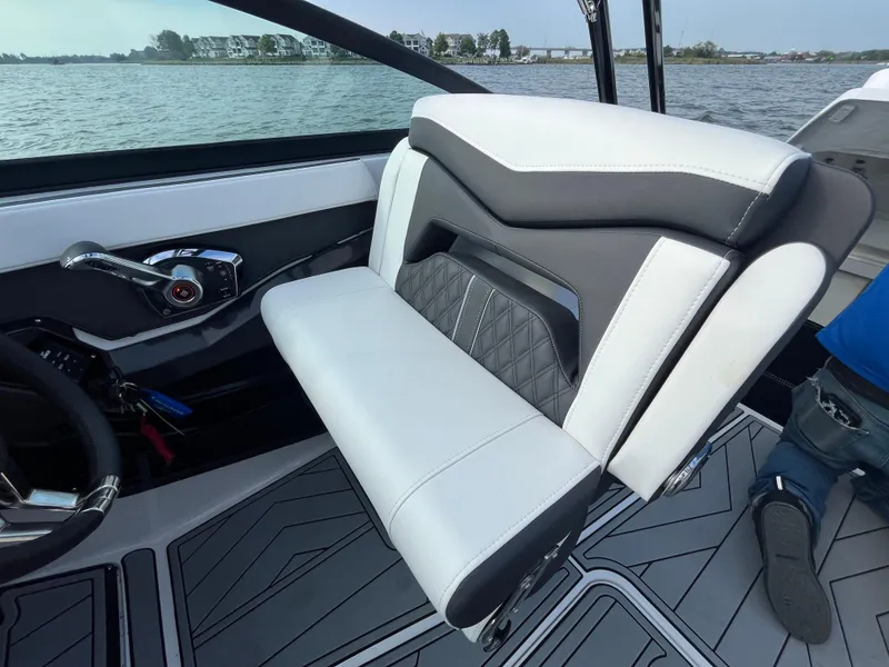 Slide: The Image of 2025 Monterey 255 Super Sport boat interior with modern seating and sleek design. - 26