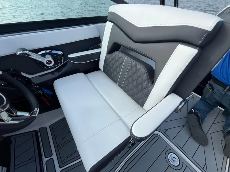 Slide: The Image of Luxury seating in 2025 Monterey 255 Super Sport boat interior. - 27