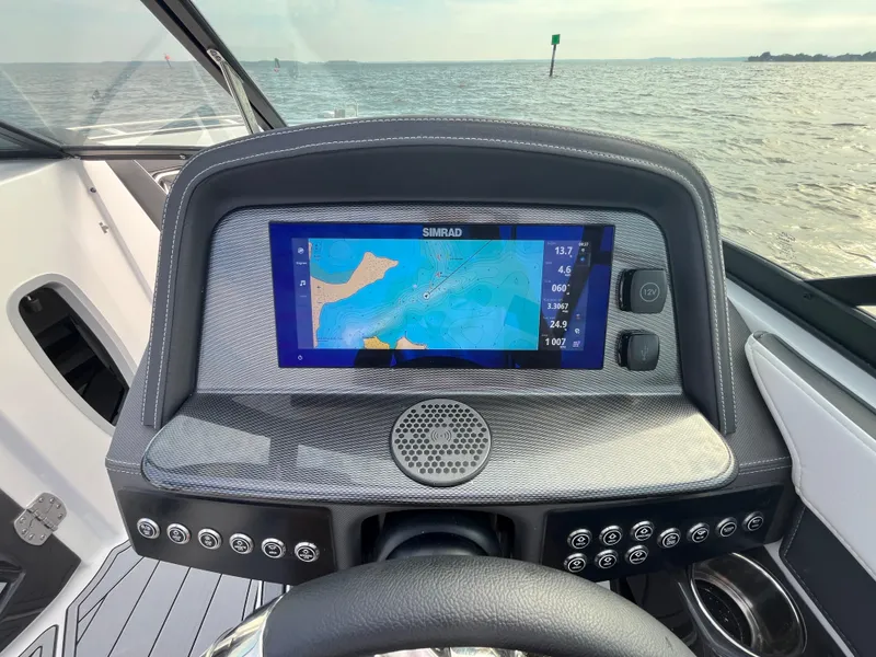 Slide: The Image of Dashboard of 2025 Monterey 255 Super Sport boat with navigation display. - 28