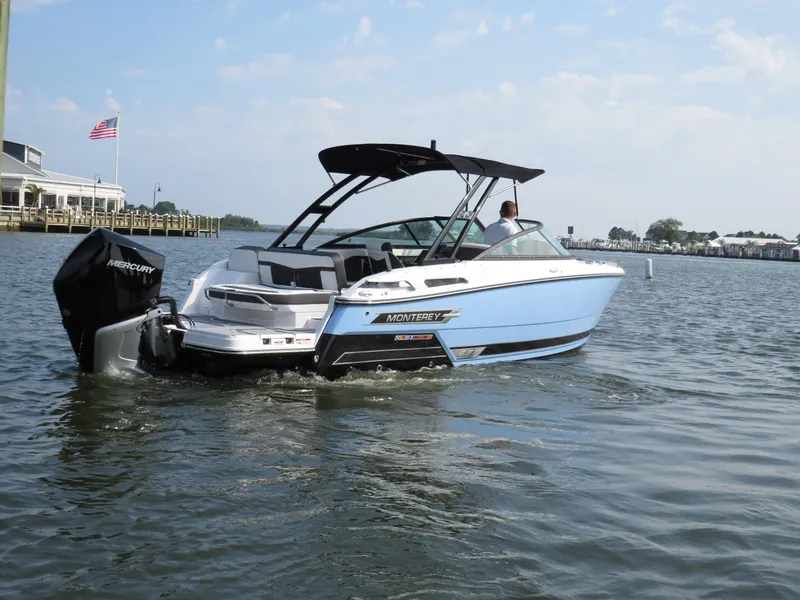Slide: The Image of 2025 Monterey 255 Super Sport boat cruising on a sunny day. - 3