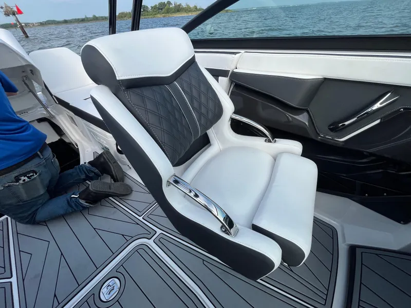 Slide: The Image of 2025 Monterey 255 Super Sport boat interior with luxurious seating and modern design. - 33