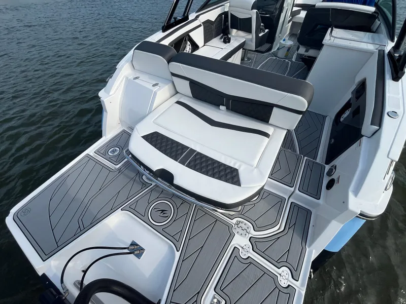 Slide: The Image of 2025 Monterey 255 Super Sport boat with sleek seating and modern design on the water. - 8