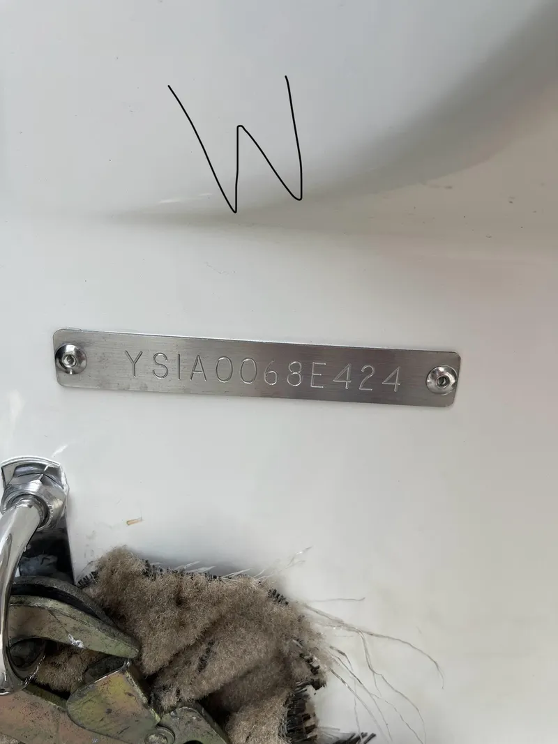 Slide: The Image of 2024 Sailfish 226 DC boat hull identification number plate. - 26
