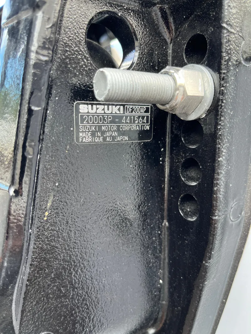 Slide: The Image of Close-up of Suzuki motor part on 2024 Sailfish 226 DC boat. - 36