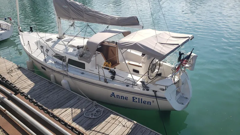 Slide: The Image of Sailboat "Anne Ellen," Catalina 36, 1994 model, docked in calm waters. - 3