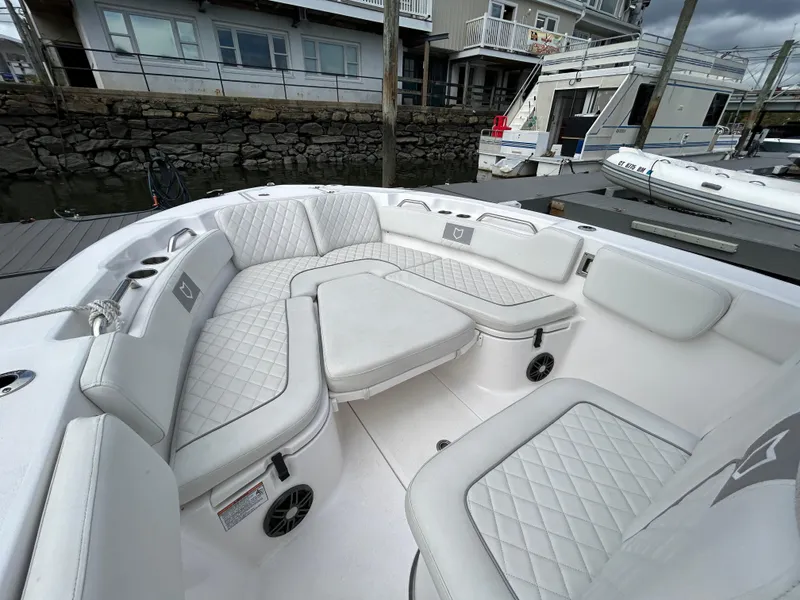 Slide: The Image of 2025 Sea Fox 248 Commander boat with luxurious white seating and modern design. - 15