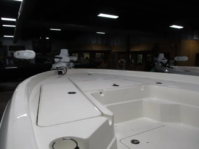 Slide: The Image of 2025 Skeeter SX230 boat interior with storage compartments and sleek design. - 9