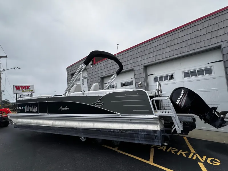 Slide: The Image of 2014 Avalon Catalina Quad Lounge 24' Triple Toon pontoon boat with Mercury outboard motor. - 5