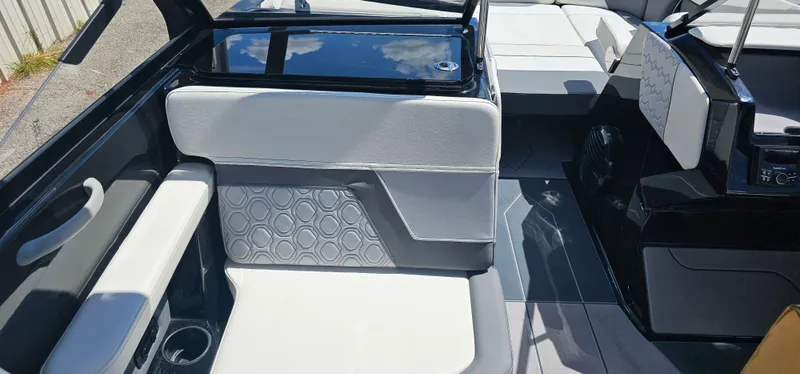 Slide: The Image of 2024 Heyday H22 boat interior with modern seating and sleek design. - 12