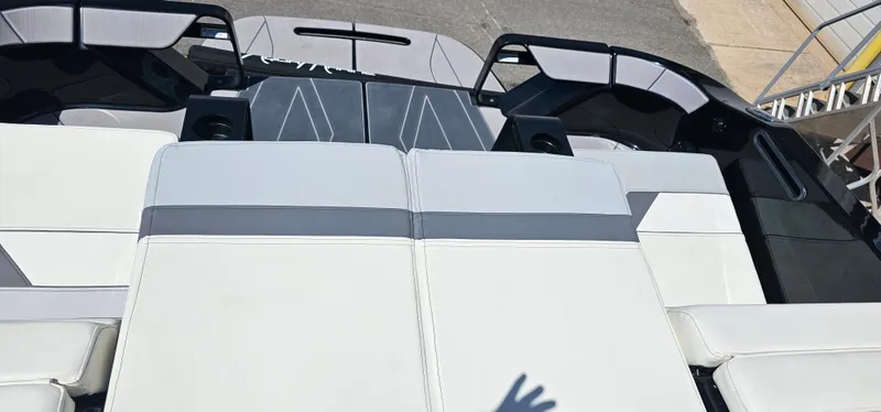 Slide: The Image of 2024 Heyday H22 boat interior with white and gray seating. - 15