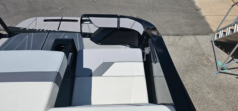 Slide: The Image of 2024 Heyday H22 boat interior with sleek gray and white seating. - 16