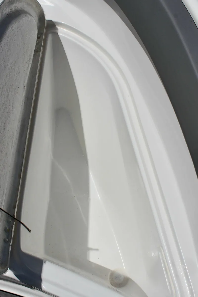 Slide: The Image of 2024 Clearwater 2200 WI Center Console boat deck detail. - 26